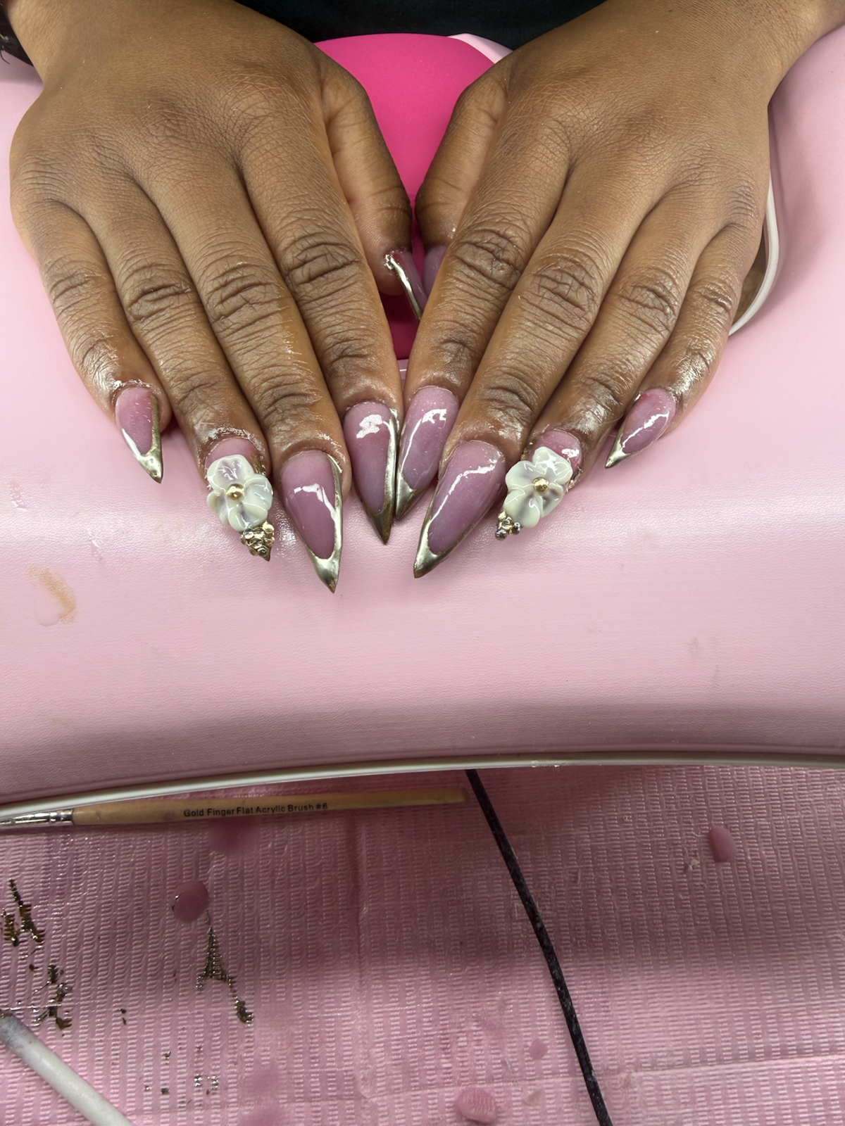 Pink and chrome sculpted acrylic nail set with white 3D flowers